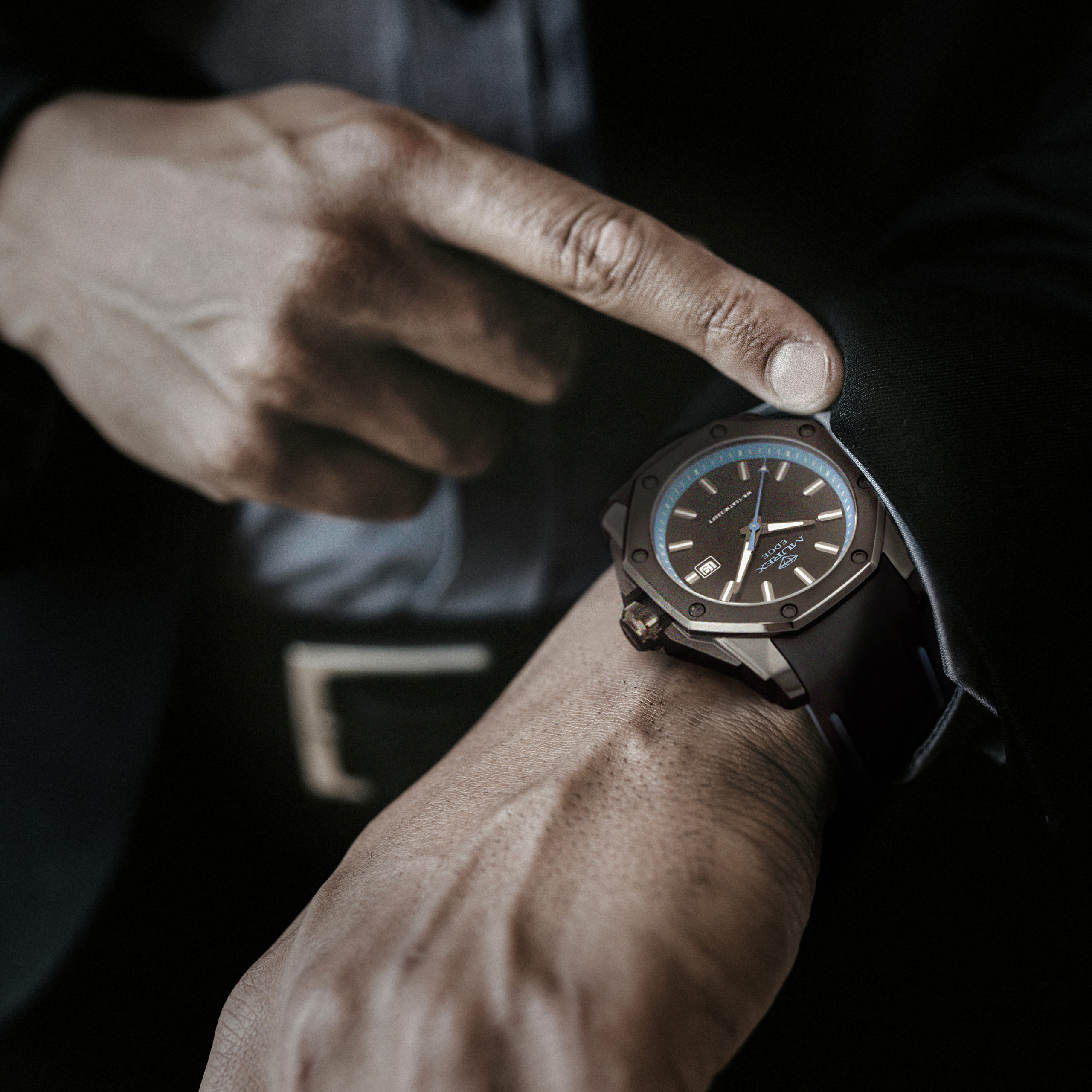Businessman checking the time